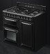 Smeg TR103BL - Cocina con Placa de Gas y 3 Hornos Eléctricos Clase A Negra